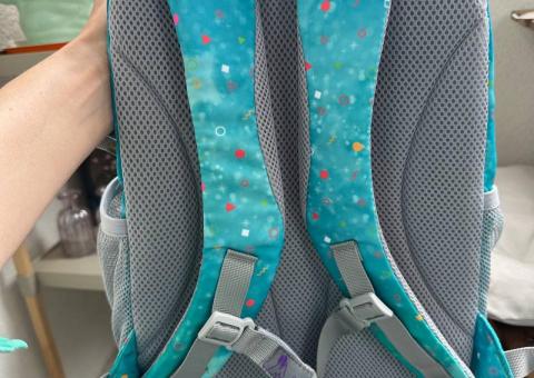 Kids' items: backpack and headphones 